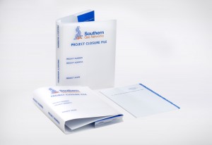 A Polysmart Project closure file, with tabbed dividers, and a large document pocket for associated project plans and paperwork.